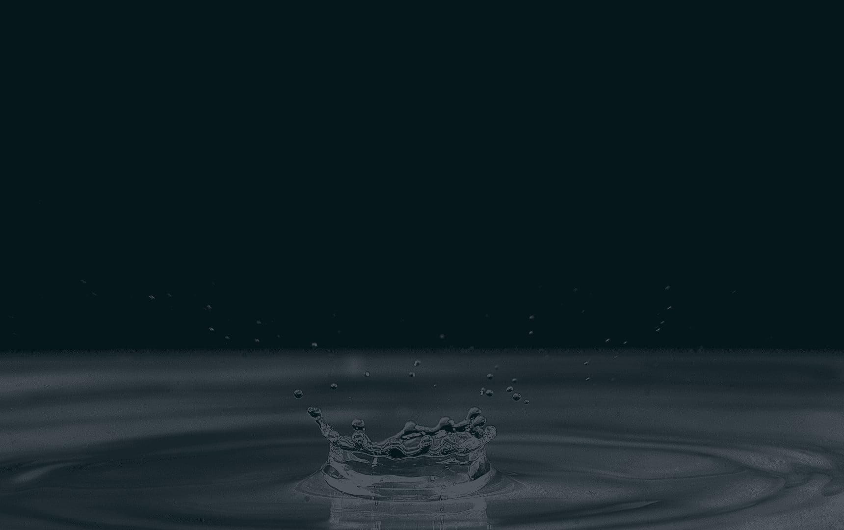 Paradise Float Spa Dark background with a splash salt therapy